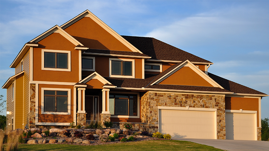 Exterior of a large, custom built family home as seen during a home inspection